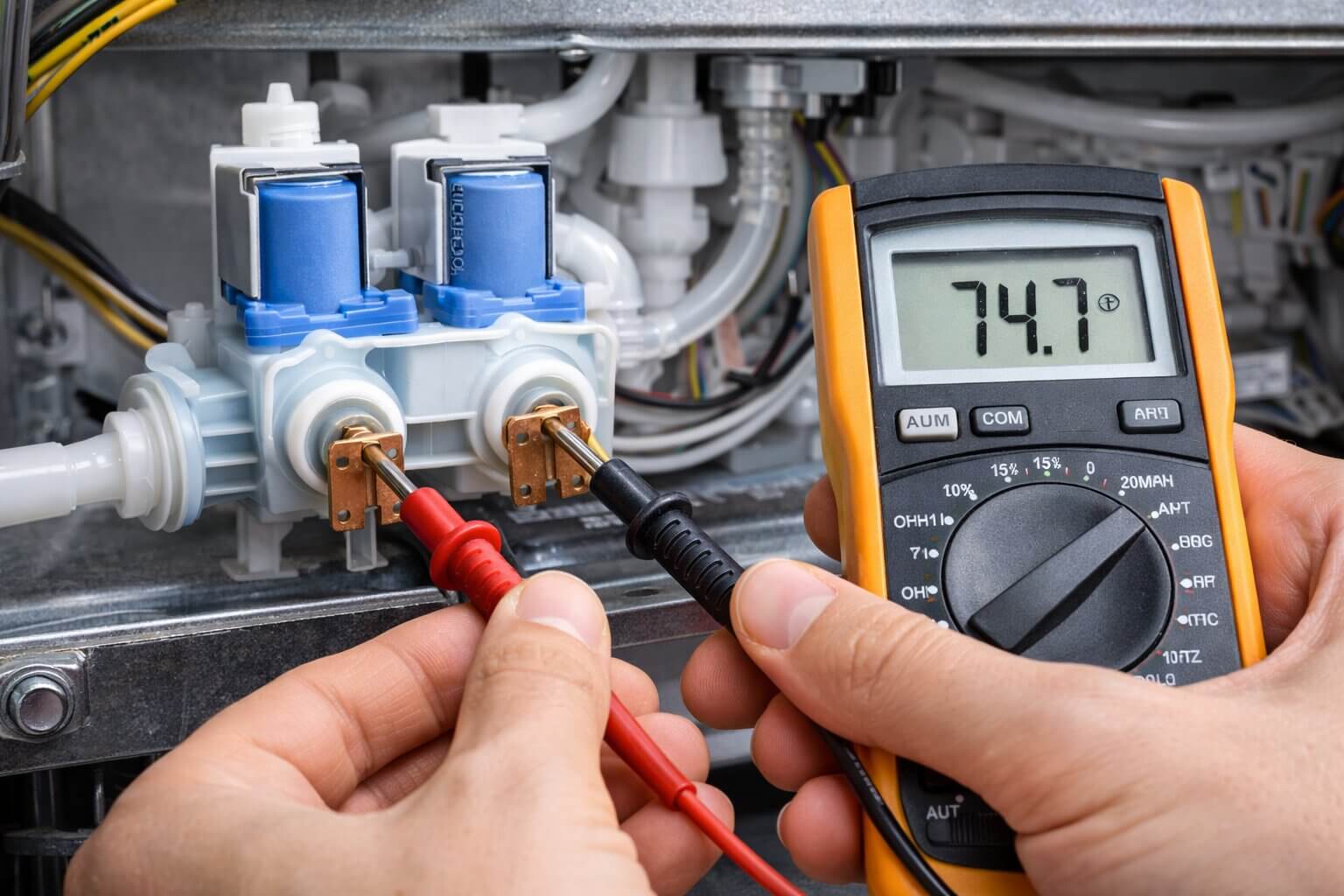 Testing a refrigerator dual water inlet valve solenoid with a digital multimeter